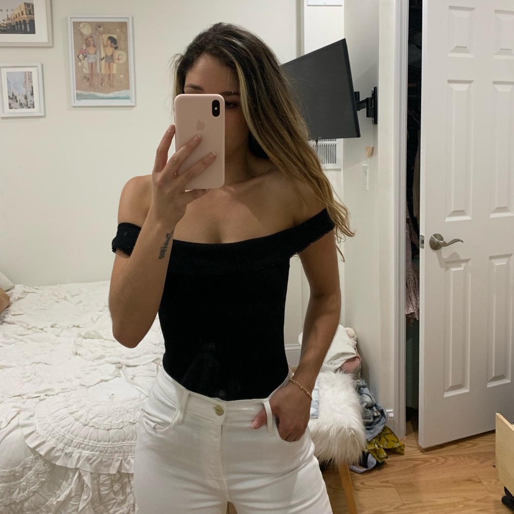 Black ribbed bodysuit with ruffle